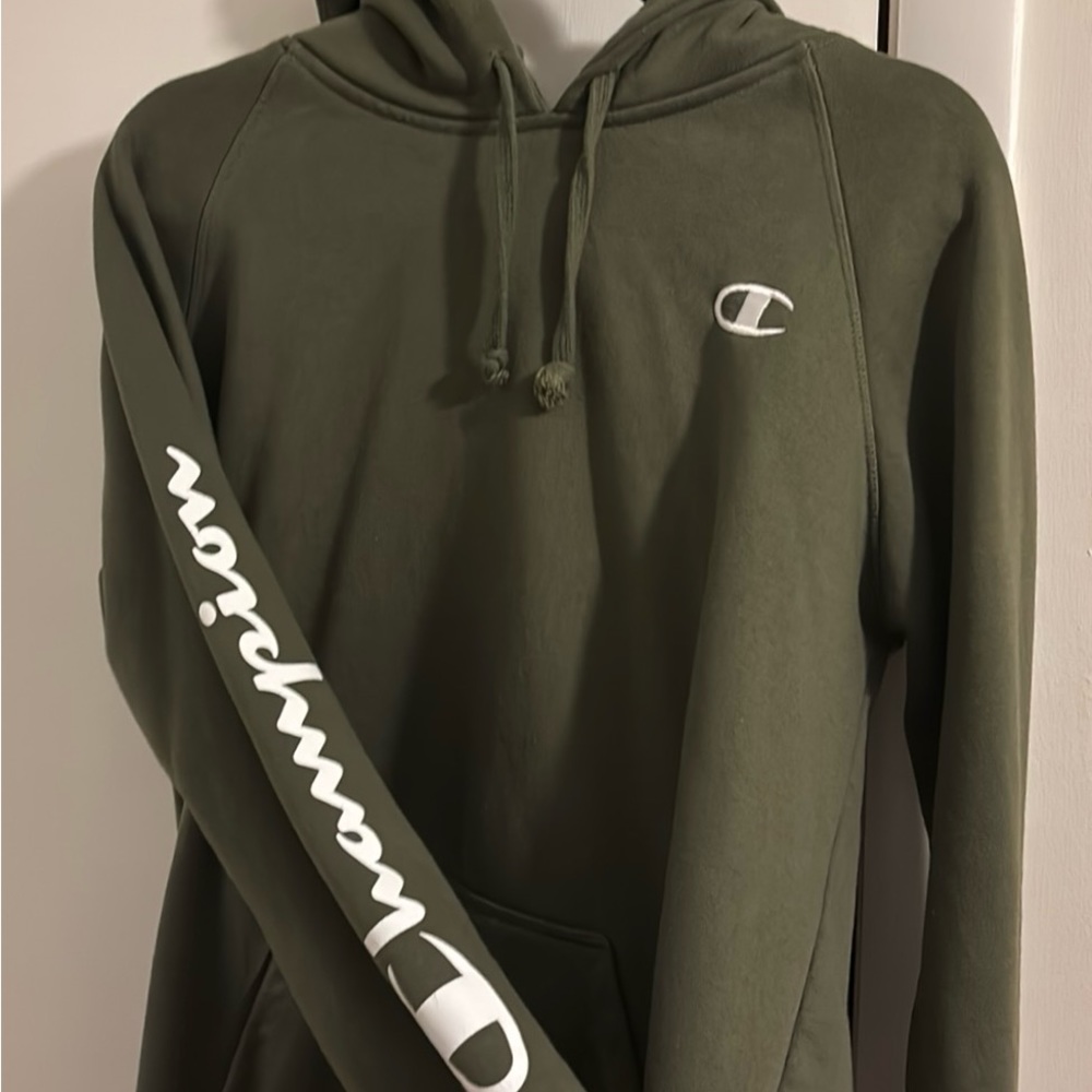 Champion Women's Hoodie, Standard Fit Pullover Reverse Weave Hoodie in Olive.